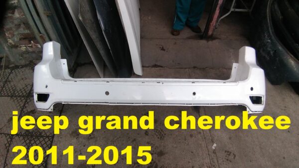 Parachoque trasero grand cherokee 2011 - 2015