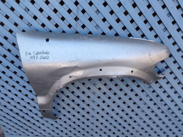 Tapabarro derecho Kia Sportage 1997 - 2002 - Imagen 2