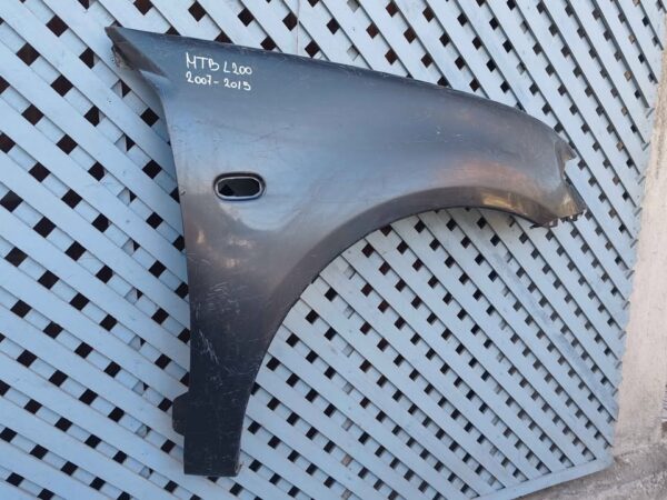 Tapabarro derecho Mitsubishi L200 2007 - 2015 - Imagen 5