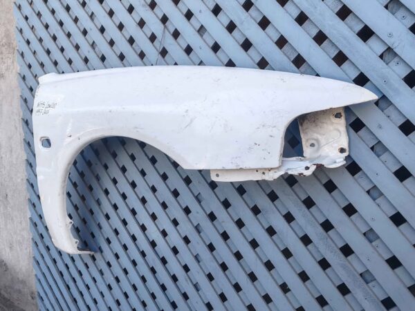 Tapabarro derecho Mitsubishi Lancer 1997 - 2001 - Imagen 4