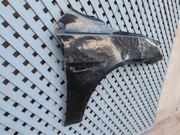 Tapabarro derecho Mitsubishi Lancer 2008 - 2015 - Imagen 4