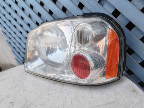 Óptico izquierdo Nissan Terreno 2005 - 2014 - Imagen 2