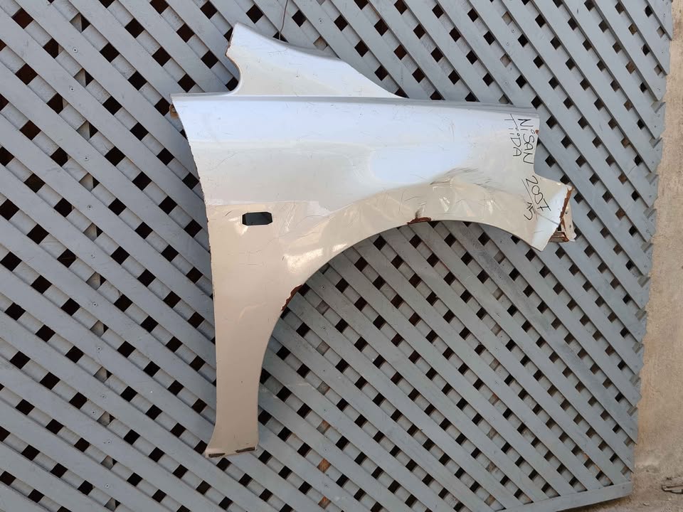 Tapabarro derecho Nissan Tiida 2007 - 2015 - Imagen 5