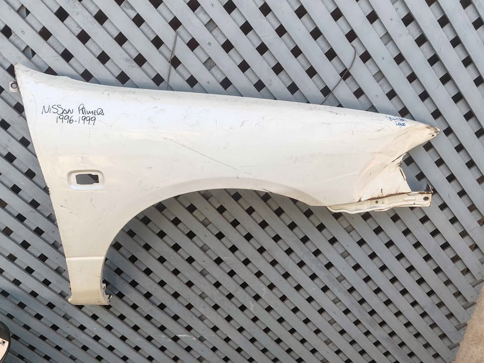 Tapabarro derecho Nissan Primera 1996 - 1999 - Imagen 2